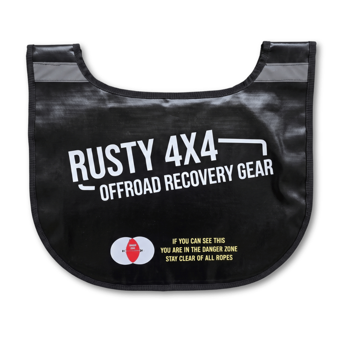 heavy duty pvc winch blanket / recovery blanket for snatch kinetic safe recoveries. Black pvc with white rusty 4x4 logo and warning sign indicating how to stay clear of a rope.