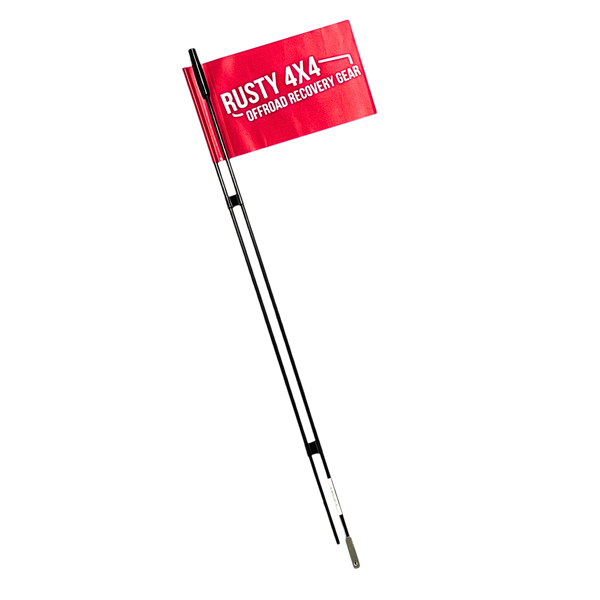 Red 4x4 dune safety flag with white logo text, attached to two black whip poles