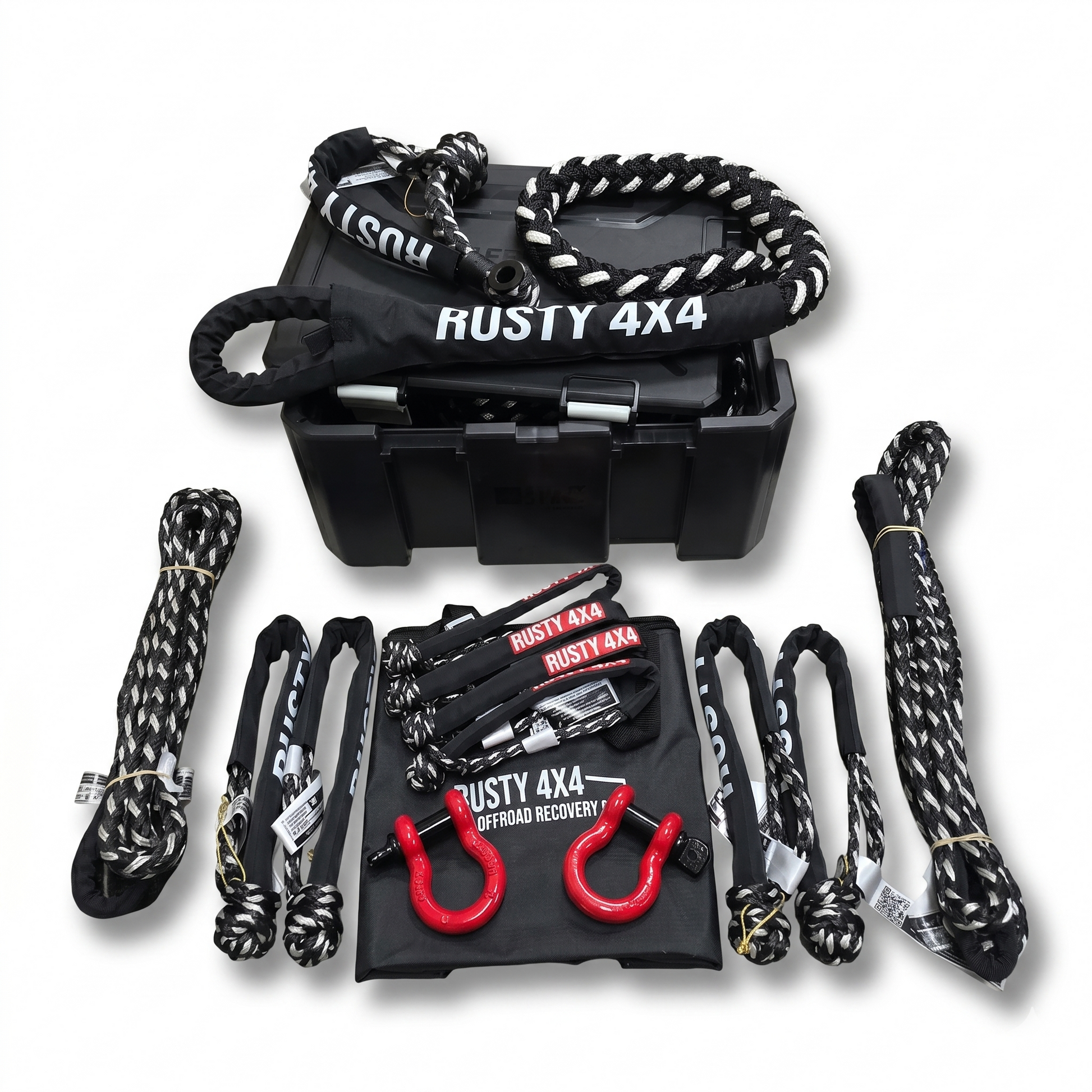 Rusty 4x4 off-road recovery equipment set with black toolbox, ropes, and hooks on a white background.